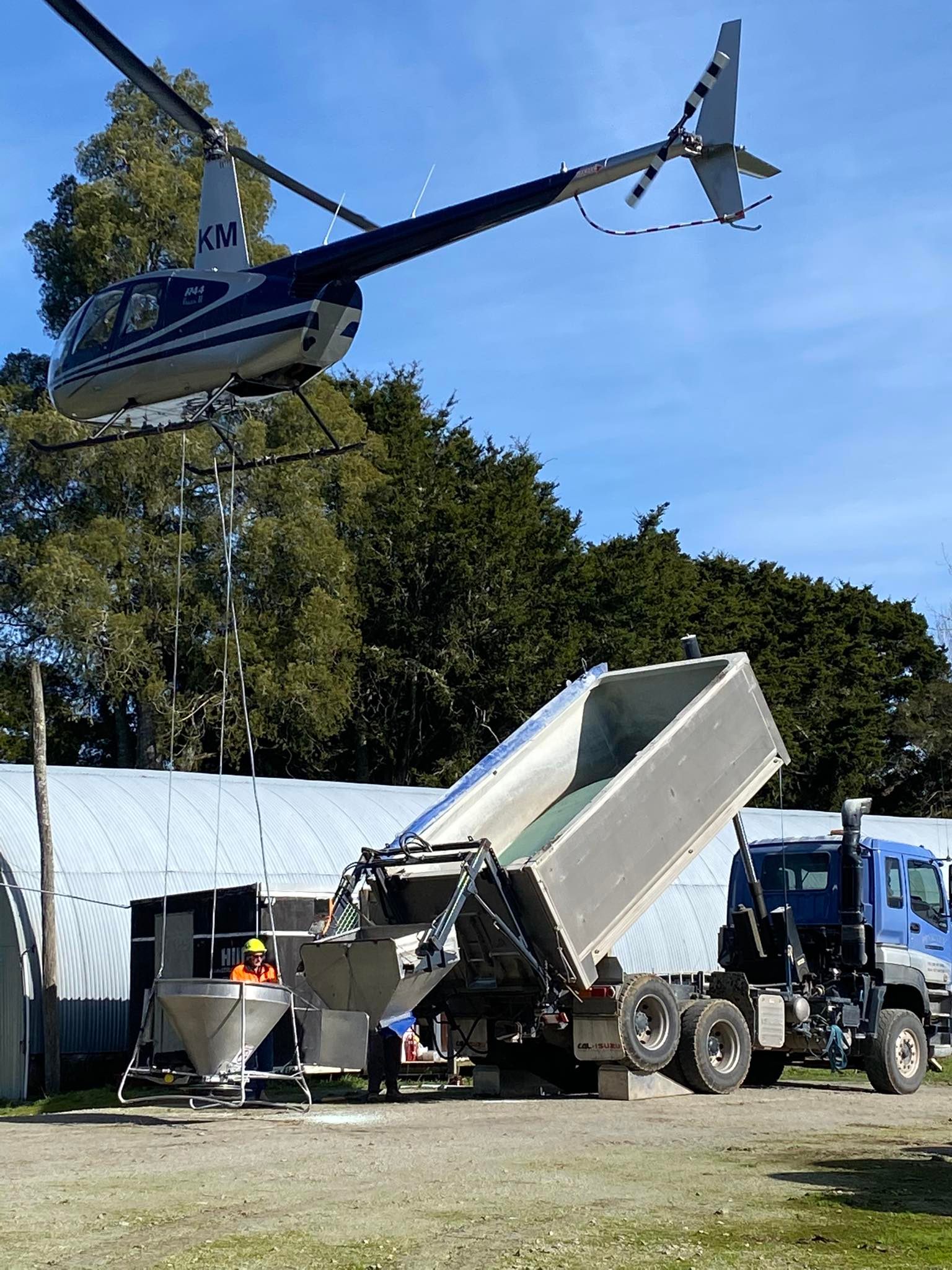 Helicopter being loaded for take-off